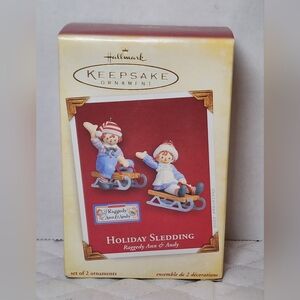 Hallmark Keepsake Christmas Ornament Raggedy Ann Andy Holiday Sledding New 2005